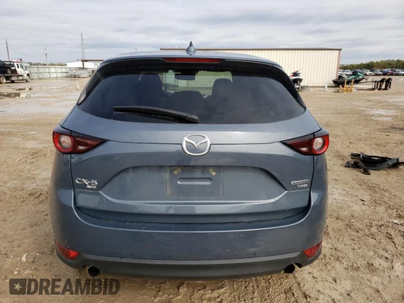 ✅ 2021 Mazda CX-5 Carbon Edition • VIN: JM3KFBCY1M0385604 • Лот: 68674952. Опубліковано раніше на Copart з пробігом 7 917 миль. Безкоштовний доступ до архіву аукціонних продажів зі США та докладний звіт про історію автомобіля на DreamBid. Зображення 6.
