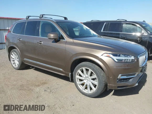 ✅ 2016 Volvo XC90 T8 Inscription • VIN: YV4BC0PLXG1052611 • Lot: 45388915. Listed on IAAI with 167,327 mi. Free auction sales archive from the USA and detailed vehicle history report at DreamBid. Image 1.