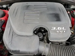 2019 Dodge Charger SXT z VIN 2C3CDXBG2KH504945, wystawiony jako Copart lot #87117395 z przebiegiem 115 128 mil mil oraz Czysty tytuł • Clean title. Historia ofert i sprzedaży dostępna na DreamBid. Obrazek 13.