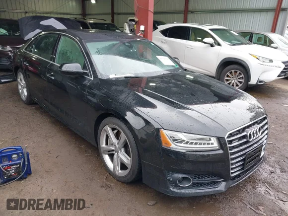 ✅ 2018 Audi A8 • VIN: WAU44AFD8JN000478 • Лот: 41726558. Опубликован ранее на IAAI с пробегом 88 668 миль. Бесплатный доступ к архиву аукционных продаж из США и подробный отчёт об истории автомобиля на DreamBid. Изображение 1.