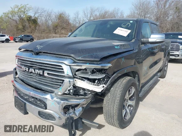 ✅ 2019 Ram 1500 Laramie • VIN: 1C6SRFJT5KN874495 • Lot: 44465395. Listed on IAAI with 87,097 mi. Free auction sales archive from the USA and detailed vehicle history report at DreamBid. Image 2.