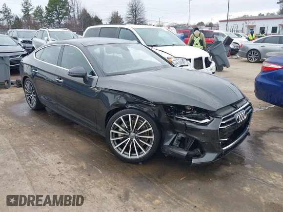 ✅ 2018 Audi A5 Sportback Prestige • VIN: WAUCNCF59JA131374 • Лот: 44392867. Опубліковано раніше на IAAI з пробігом 64 525 миль. Безкоштовний доступ до архіву аукціонних продажів зі США та докладний звіт про історію автомобіля на DreamBid. Зображення 1.