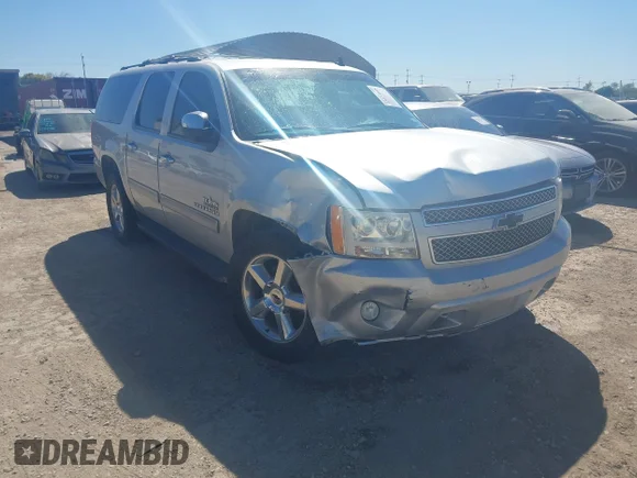 ✅ 2014 Chevrolet Suburban LS • VIN: 1GNSCHE06ER165763 • Lot: 43473605. Listed on IAAI with 199,541 mi. Free auction sales archive from the USA and detailed vehicle history report at DreamBid. Image 1.