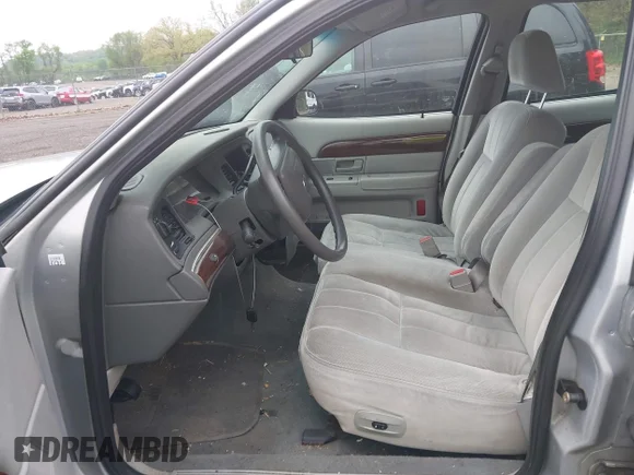 ✅ 2003 Mercury Grand Marquis GS Convenience • VIN: 2MEFM74W33X655571 • Lot: 44930822. Wystawiony na IAAI z przebiegiem 175 560 mil. Bezpłatny archiwum sprzedaży aukcyjnych z USA i szczegółowy raport historii pojazdu na DreamBid. Zdjęcie 5.