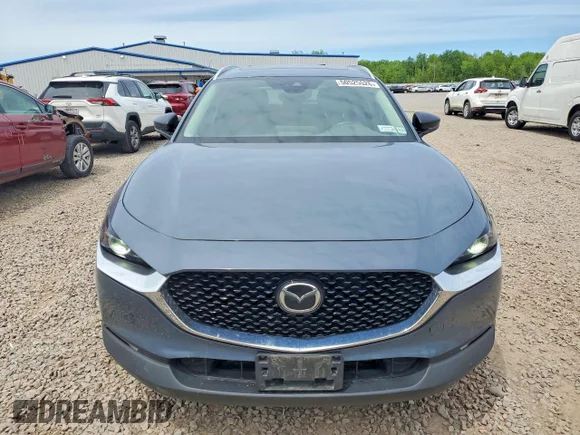 ✅ 2022 Mazda CX-30 S Carbon Edition • VIN: 3MVDMBCL5NM453329 • Лот: 50525526. Опубліковано раніше на Copart з пробігом 74 674 миль. Безкоштовний доступ до архіву аукціонних продажів зі США та докладний звіт про історію автомобіля на DreamBid. Зображення 5.