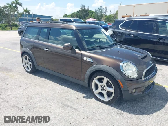 ✅ 2010 MINI Clubman S • VIN: WMWMM3C52ATZ33216 • Lot: 45489570. Listed on IAAI with 101,971 mi. Free auction sales archive from the USA and detailed vehicle history report at DreamBid. Image 1.