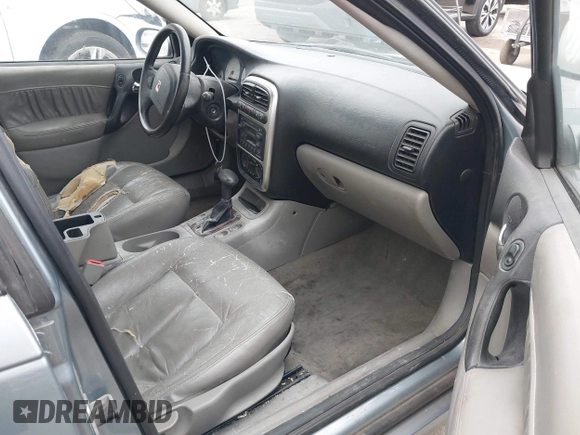 ✅ 2004 Saturn L • VIN: 1G8JL54R64Y506855 • Lot: 42349223. Listed on IAAI with 212,231 mi. Free auction sales archive from the USA and detailed vehicle history report at DreamBid. Image 5.