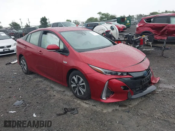 ✅ 2018 Toyota Prius Advanced • VIN: JTDKARFP8J3087368 • Лот: 45040478. Опубликован ранее на IAAI с пробегом 124 796 миль. Бесплатный доступ к архиву аукционных продаж из США и подробный отчёт об истории автомобиля на DreamBid. Изображение 1.