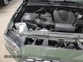 ✅ 2022 Toyota Tacoma TRD Off Road • VIN: 3TMDZ5BN6NM136702 • Лот: 86256785. Опубликован ранее на Copart с пробегом 38 639 миль. Бесплатный доступ к архиву аукционных продаж из США и подробный отчёт об истории автомобиля на DreamBid. Изображение 14.