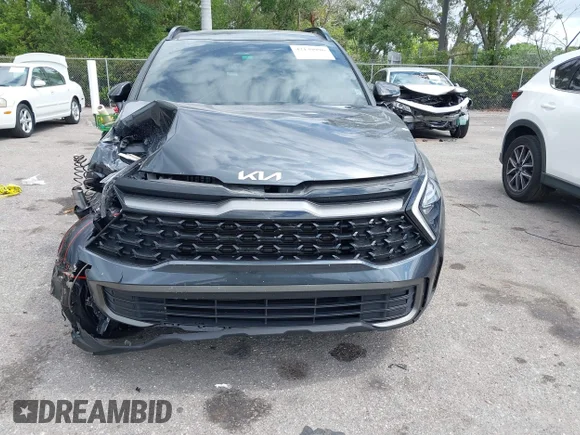 ✅ 2023 Kia Sportage X-Line • VIN: 5XYK6CAF5PG057858 • Lot: 42139996. Wystawiony na IAAI z przebiegiem 57 252 mil. Bezpłatny archiwum sprzedaży aukcyjnych z USA i szczegółowy raport historii pojazdu na DreamBid. Zdjęcie 6.