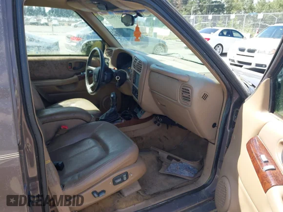 ✅ 1999 Oldsmobile Bravada • VIN: 1GHDT13W8X2714756 • Lot: 42739424. Wystawiony na IAAI z przebiegiem 162 486 mil. Bezpłatny archiwum sprzedaży aukcyjnych z USA i szczegółowy raport historii pojazdu na DreamBid. Zdjęcie 5.