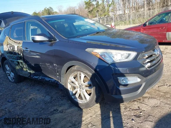✅ 2014 Hyundai Santa Fe • VIN: 5XYZWDLA5EG129676 • Lot: 41510085. Wystawiony na IAAI z przebiegiem 136 026 mil. Bezpłatny archiwum sprzedaży aukcyjnych z USA i szczegółowy raport historii pojazdu na DreamBid. Zdjęcie 1.