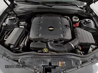 ✅ 2012 Chevrolet Camaro 1LS • VIN: 2G1FE1E38C9199337 • Lot: 68201725. Wystawiony na Copart z przebiegiem 98 719 mil. Bezpłatny archiwum sprzedaży aukcyjnych z USA i szczegółowy raport historii pojazdu na DreamBid. Zdjęcie 14.