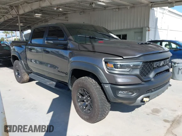 ✅ 2023 Ram 1500 TRX • VIN: 1C6SRFU97PN564307 • Лот: 42882566. Опубликован ранее на IAAI с пробегом 61 860 миль. Бесплатный доступ к архиву аукционных продаж из США и подробный отчёт об истории автомобиля на DreamBid. Изображение 1.