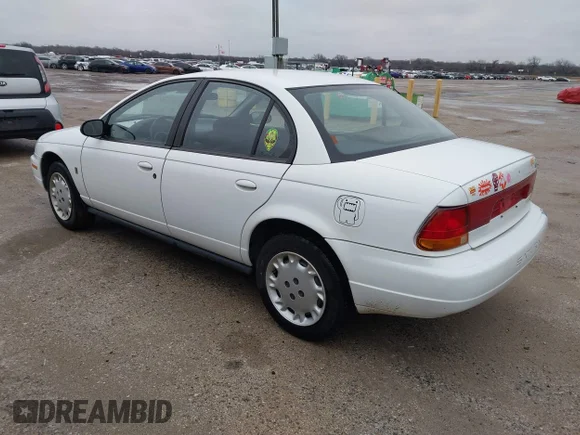 ✅ 1997 Saturn SL • VIN: 1G8ZK5274VZ196952 • Lot: 41514958. Wystawiony na IAAI z przebiegiem 125 683 mil. Bezpłatny archiwum sprzedaży aukcyjnych z USA i szczegółowy raport historii pojazdu na DreamBid. Zdjęcie 3.