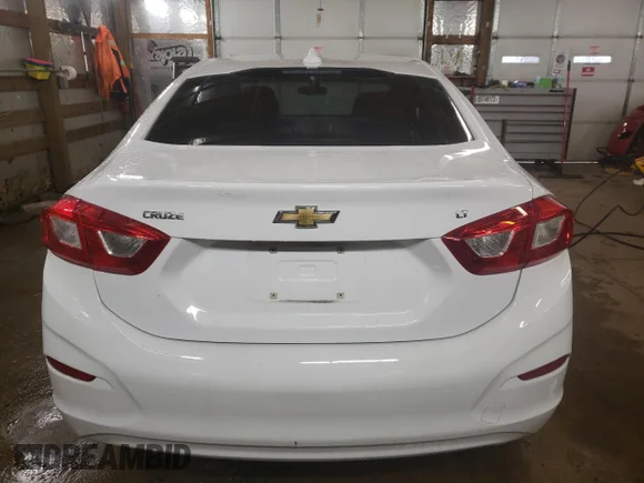 ✅ 2016 Chevrolet Cruze LT • VIN: 1G1BE5SM4G7308550 • Lot: 71241092. Wystawiony na Copart z przebiegiem 98 422 mil. Bezpłatny archiwum sprzedaży aukcyjnych z USA i szczegółowy raport historii pojazdu na DreamBid. Zdjęcie 6.