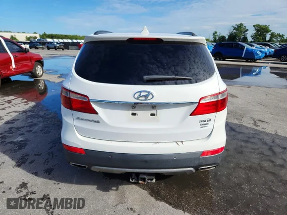 ✅ 2014 Hyundai Santa Fe Limited • VIN: KM8SRDHF0EU081754 • Лот: 58367236. Опубліковано раніше на Copart з пробігом 175 150 миль. Безкоштовний доступ до архіву аукціонних продажів зі США та докладний звіт про історію автомобіля на DreamBid. Зображення 6.