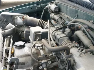 ✅ 2002 Toyota Tacoma • VIN: 5TENL42N52Z119257 • Lot: 42611488. Listed on IAAI with 114,507 mi. Free auction sales archive from the USA and detailed vehicle history report at DreamBid. Image 12.