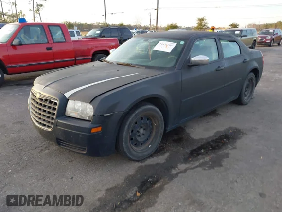 ✅ 2008 Chrysler 300 LX • VIN: 2C3KA43R58H222309 • Lot: 41451366. Wystawiony na IAAI z przebiegiem 150 345 mil. Bezpłatny archiwum sprzedaży aukcyjnych z USA i szczegółowy raport historii pojazdu na DreamBid. Zdjęcie 2.