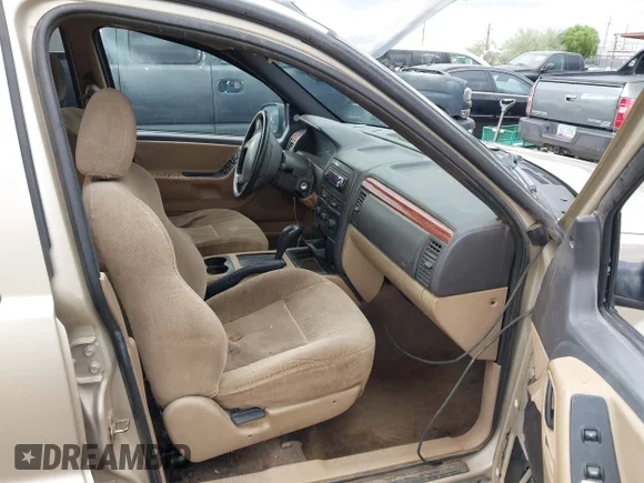 ✅ 1999 Jeep Grand Cherokee Laredo • VIN: 1J4G258S5XC601631 • Lot: 43393960. Wystawiony na IAAI z przebiegiem 340 636 mil. Bezpłatny archiwum sprzedaży aukcyjnych z USA i szczegółowy raport historii pojazdu na DreamBid. Zdjęcie 5.