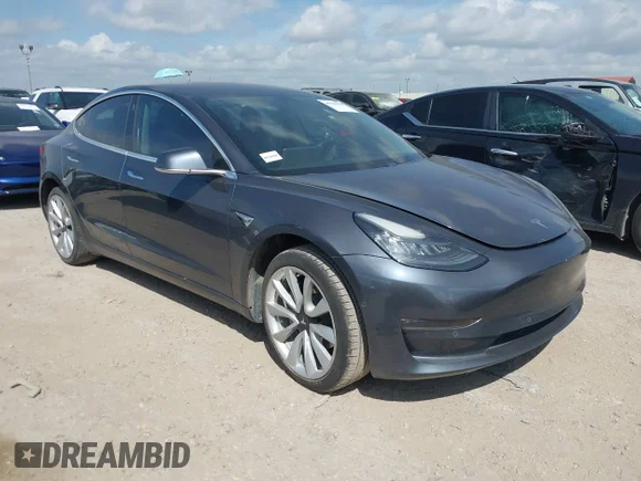 ✅ 2018 Tesla Model 3 Long Range Battery • VIN: 5YJ3E1EA7JF009562 • Lot: 45530900. Listed on IAAI with 77,643 mi. Free auction sales archive from the USA and detailed vehicle history report at DreamBid. Image 1.