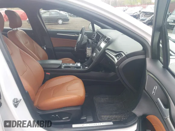 ✅ 2019 Ford Fusion Titanium • VIN: 3FA6P0RU9KR212786 • Lot: 44929999. Wystawiony na IAAI z przebiegiem 100 400 mil. Bezpłatny archiwum sprzedaży aukcyjnych z USA i szczegółowy raport historii pojazdu na DreamBid. Zdjęcie 5.