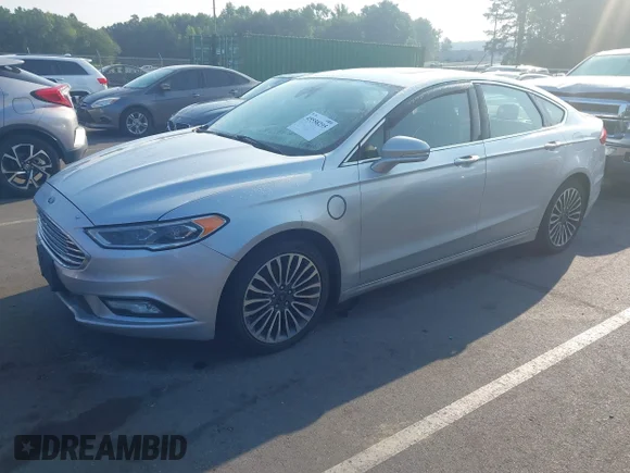 ✅ 2017 Ford Fusion Titanium • VIN: 3FA6P0SU5HR173231 • Lot: 45558295. Wystawiony na IAAI z przebiegiem 264 821 mil. Bezpłatny archiwum sprzedaży aukcyjnych z USA i szczegółowy raport historii pojazdu na DreamBid. Zdjęcie 2.