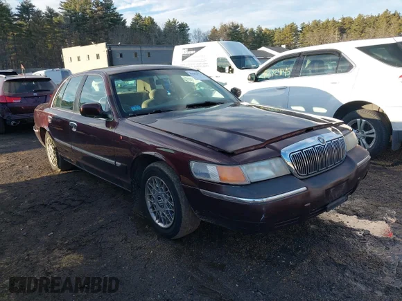 ✅ 2001 Mercury Grand Marquis GS • VIN: 2MEFM74W41X660632 • Лот: 43962973. Опубліковано раніше на IAAI з пробігом 97 228 миль. Безкоштовний доступ до архіву аукціонних продажів зі США та докладний звіт про історію автомобіля на DreamBid. Зображення 1.