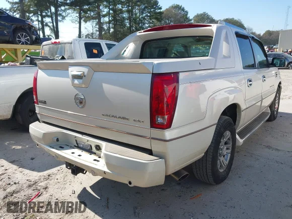 ✅ 2004 Cadillac Escalade EXT • VIN: 3GYEK62N64G279574 • Lot: 41490016. Wystawiony na IAAI z przebiegiem 243 577 mil. Bezpłatny archiwum sprzedaży aukcyjnych z USA i szczegółowy raport historii pojazdu na DreamBid. Zdjęcie 4.