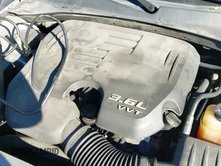 ✅ 2014 Chrysler 300 Uptown Edition • VIN: 2C3CCAAG5EH340189 • Лот: 43607570. Опубликован ранее на IAAI с пробегом 139 618 миль. Бесплатный доступ к архиву аукционных продаж из США и подробный отчёт об истории автомобиля на DreamBid. Изображение 13.