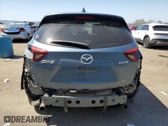 ✅ 2016 Mazda CX-5 Grand Touring • VIN: JM3KE2DY7G0644764 • Lot: 48538243. Listed on Copart with 50,937 mi. Free auction sales archive from the USA and detailed vehicle history report at DreamBid. Image 6.