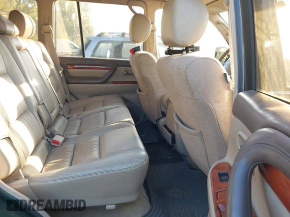 ✅ 1998 Lexus LX 470 • VIN: JT6HT00W3W0006129 • Lot: 43443373. Wystawiony na IAAI z przebiegiem 211 937 mil. Bezpłatny archiwum sprzedaży aukcyjnych z USA i szczegółowy raport historii pojazdu na DreamBid. Zdjęcie 8.