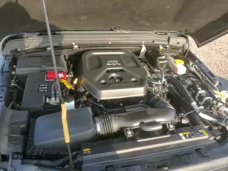 ✅ 2023 Jeep Wrangler High Altitude • VIN: 1C4HJXEN5PW508257 • Lot: 60988235. Wystawiony na Copart z przebiegiem 34 990 mil. Bezpłatny archiwum sprzedaży aukcyjnych z USA i szczegółowy raport historii pojazdu na DreamBid. Zdjęcie 14.