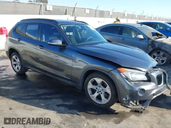 ✅ 2015 BMW X1 sDrive28i • VIN: WBAVM1C51FV314580 • Lot: 41679817. Listed on IAAI with 81,076 mi. Free auction sales archive from the USA and detailed vehicle history report at DreamBid. Image 1.