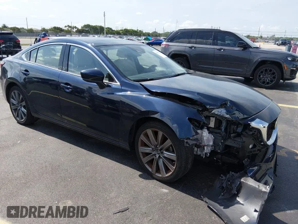 ✅ 2020 Mazda 6 Touring • VIN: JM1GL1VMXL1511396 • Lot: 45094079. Wystawiony na IAAI z przebiegiem 40 595 mil. Bezpłatny archiwum sprzedaży aukcyjnych z USA i szczegółowy raport historii pojazdu na DreamBid. Zdjęcie 1.
