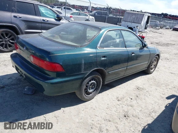 ✅ 1999 Acura Integra LS • VIN: JH4DB7658XS002311 • Lot: 41697843. Wystawiony na IAAI z przebiegiem 235 682 mil. Bezpłatny archiwum sprzedaży aukcyjnych z USA i szczegółowy raport historii pojazdu na DreamBid. Zdjęcie 4.