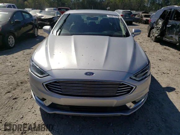 ✅ 2018 Ford Fusion Titanium • VIN: 3FA6P0RU6JR155543 • Lot: 46081033. Wystawiony na Copart z przebiegiem 76 466 mil. Bezpłatny archiwum sprzedaży aukcyjnych z USA i szczegółowy raport historii pojazdu na DreamBid. Zdjęcie 5.
