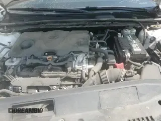 2019 Toyota Camry LE z VIN 4T1B11HK9KU828945, wystawiony jako Copart lot #62388185 z przebiegiem 95 180 mil mil oraz Szkoda całkowita • Salvage title. Historia ofert i sprzedaży dostępna na DreamBid. Obrazek 16.