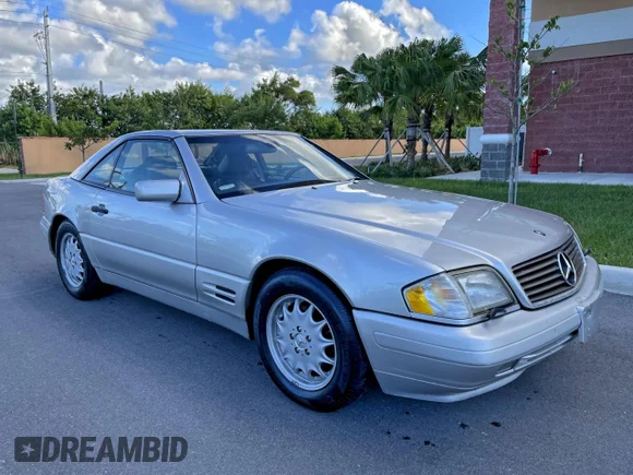 ✅ 1998 Mercedes-Benz SL 500 • VIN: WDBFA67F7WF164449 • Lot: 94335565. Listed on Copart with 104,452 mi. Free auction sales archive from the USA and detailed vehicle history report at DreamBid. Image 1.
