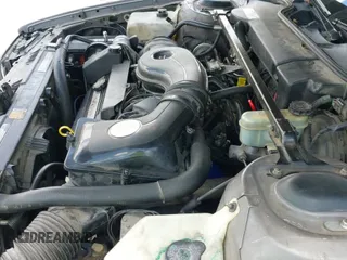 ✅ 1992 Cadillac DeVille • VIN: 1G6CD53B2N4335372 • Lot: 42215455. Listed on IAAI with 192,828 mi. Free auction sales archive from the USA and detailed vehicle history report at DreamBid. Image 12.