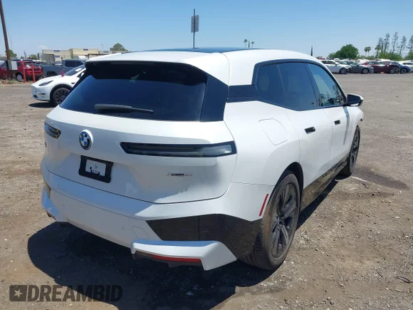 ✅ 2023 BMW iX xDrive50 • VIN: WB523CF04PCM04691 • Лот: 42485131. Опубликован ранее на IAAI с пробегом 26 330 миль. Бесплатный доступ к архиву аукционных продаж из США и подробный отчёт об истории автомобиля на DreamBid. Изображение 4.