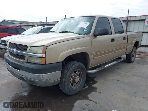 ✅ 2004 Chevrolet Silverado 2500HD LS • VIN: 1GCHC23U14F111681 • Lot: 41572118. Wystawiony na IAAI z przebiegiem 410 470 mil. Bezpłatny archiwum sprzedaży aukcyjnych z USA i szczegółowy raport historii pojazdu na DreamBid. Zdjęcie 2.