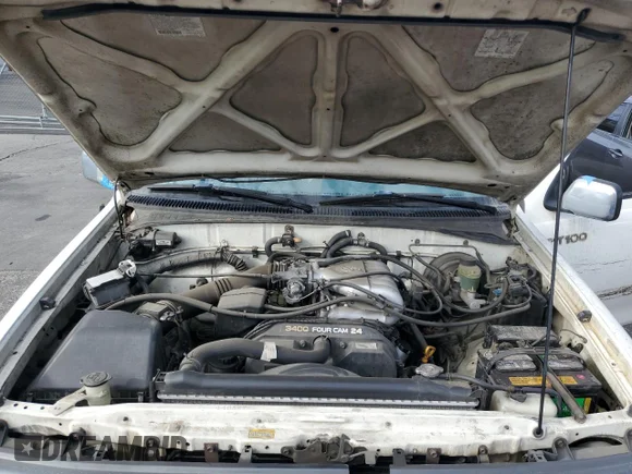 ✅ 1998 Toyota T100 SR5 • VIN: JT4TN14D6W0040562 • Lot: 81951875. Wystawiony na Copart z przebiegiem 203 764 mil. Bezpłatny archiwum sprzedaży aukcyjnych z USA i szczegółowy raport historii pojazdu na DreamBid. Zdjęcie 11.