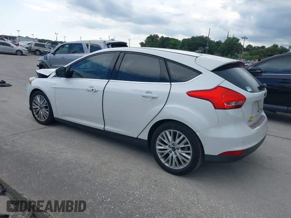 ✅ 2016 Ford Focus Titanium • VIN: 1FADP3N23GL307041 • Lot: 45174441. Wystawiony na IAAI z przebiegiem 114 704 mil. Bezpłatny archiwum sprzedaży aukcyjnych z USA i szczegółowy raport historii pojazdu na DreamBid. Zdjęcie 3.