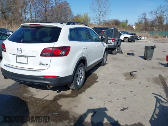 ✅ 2015 Mazda CX-9 Touring • VIN: JM3TB3CV9F0462931 • Лот: 41912768. Опубліковано раніше на IAAI з пробігом 159 413 миль. Безкоштовний доступ до архіву аукціонних продажів зі США та докладний звіт про історію автомобіля на DreamBid. Зображення 4.