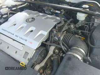 ✅ 2001 Cadillac Eldorado ESC • VIN: 1G6EL12Y01B104230 • Lot: 42521397. Listed on IAAI with 60,570 mi. Free auction sales archive from the USA and detailed vehicle history report at DreamBid. Image 12.