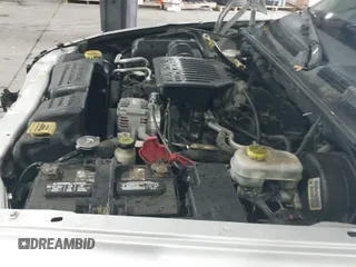 ✅ 2004 Dodge Dakota SLT • VIN: 1D7HG48N64S523528 • Lot: 41199575. Wystawiony na IAAI z przebiegiem 261 239 mil. Bezpłatny archiwum sprzedaży aukcyjnych z USA i szczegółowy raport historii pojazdu na DreamBid. Zdjęcie 20.