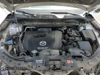 ✅ 2017 Mazda CX-5 Grand Touring • VIN: JM3KFADL9H0224601 • Lot: 67771645. Wystawiony na Copart z przebiegiem 91 067 mil. Bezpłatny archiwum sprzedaży aukcyjnych z USA i szczegółowy raport historii pojazdu na DreamBid. Zdjęcie 14.