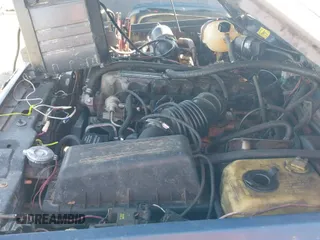 ✅ 1990 Jeep Cherokee Laredo • VIN: 1J4FJ58L9LL153251 • Lot: 43607207. Listed on IAAI with 418,020 mi. Free auction sales archive from the USA and detailed vehicle history report at DreamBid. Image 12.