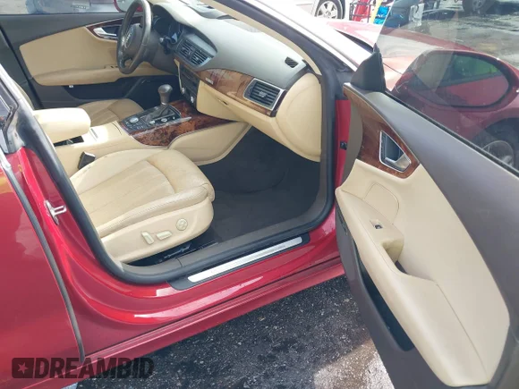 ✅ 2012 Audi A7 Prestige • VIN: WAU3GAFC1CN103738 • Лот: 44084279. Опубліковано раніше на IAAI з пробігом 141 794 миль. Безкоштовний доступ до архіву аукціонних продажів зі США та докладний звіт про історію автомобіля на DreamBid. Зображення 5.